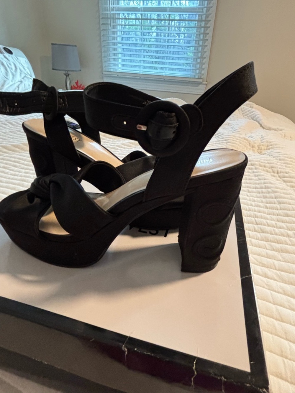 Nine West high heel with embroidered heel.